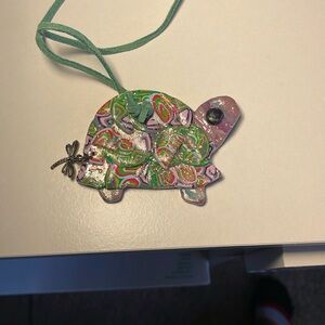 Turtle pendant, handmade by local artist, signed. Suede cord.